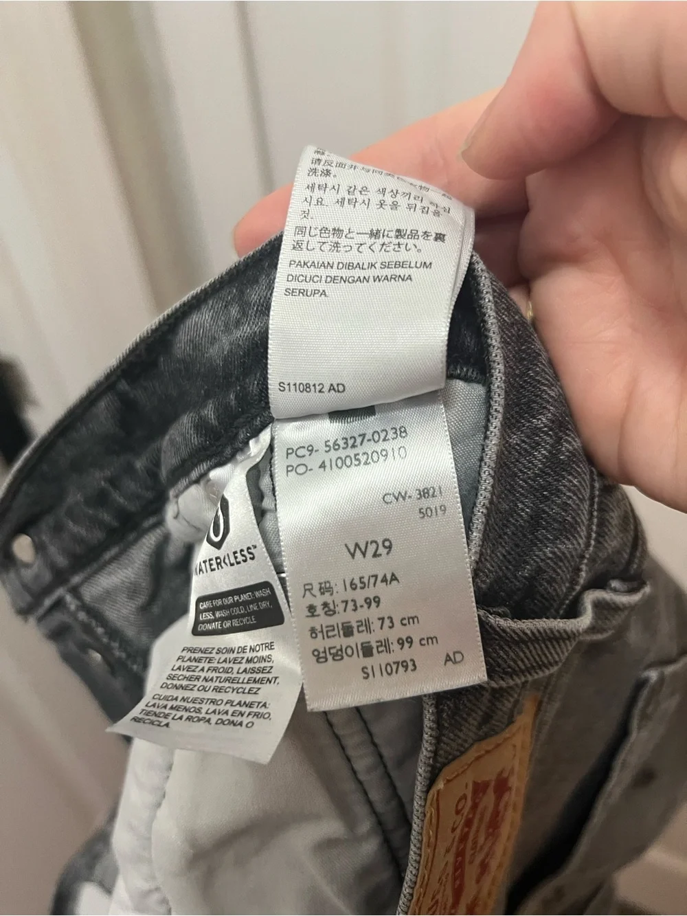 Levi’s Mid-Rise Black Denim Cutoff Shorts